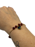 Crimson Stone Bracelet with Black Heart Pendant
