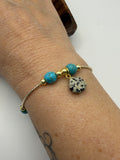 Turquoise Bead Bracelet with Dalmatian Jasper Charm – Gold Accent Stretch Bracelet