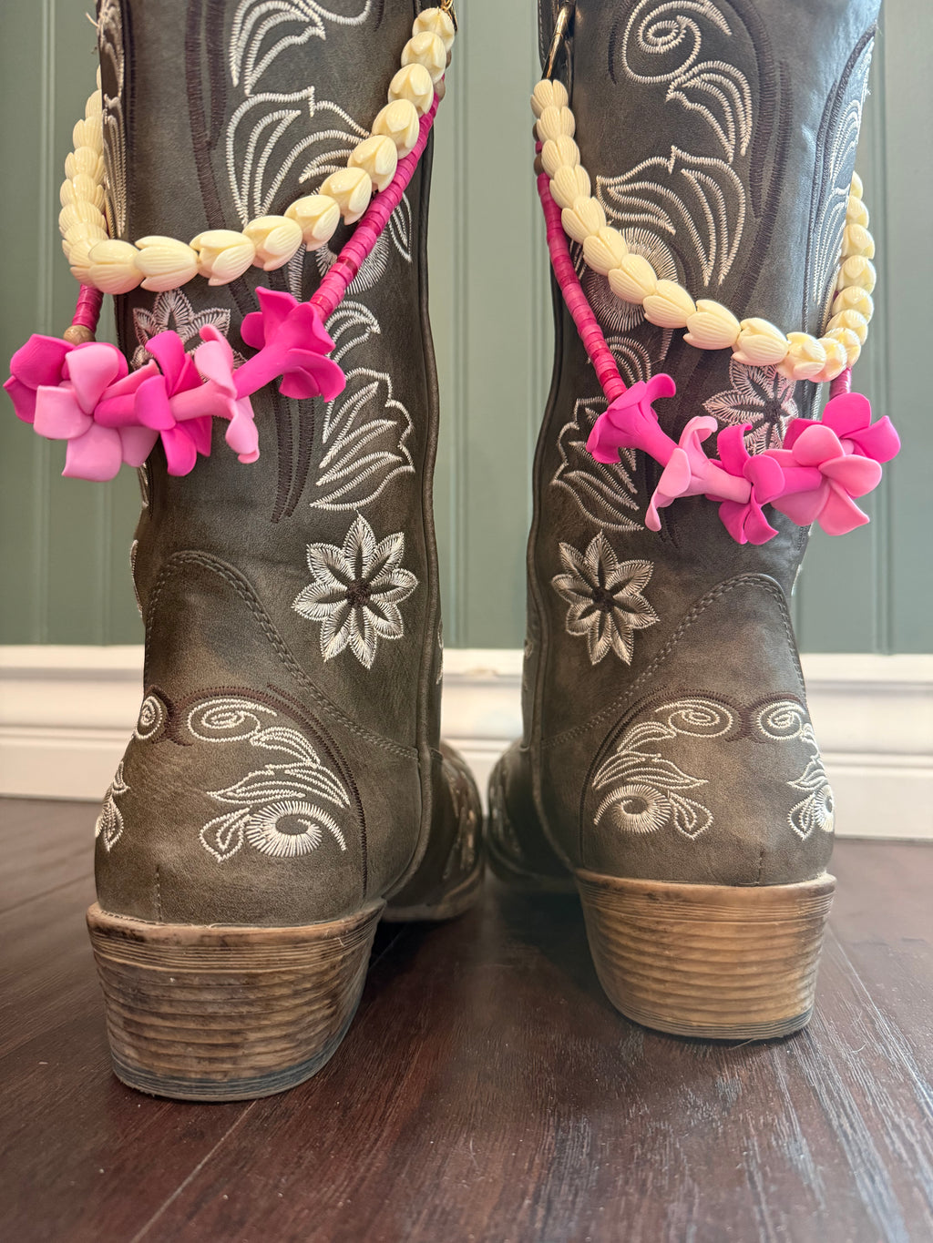 brown boots with decorative beaded double  lei with pink clay flowers and white piakake beads