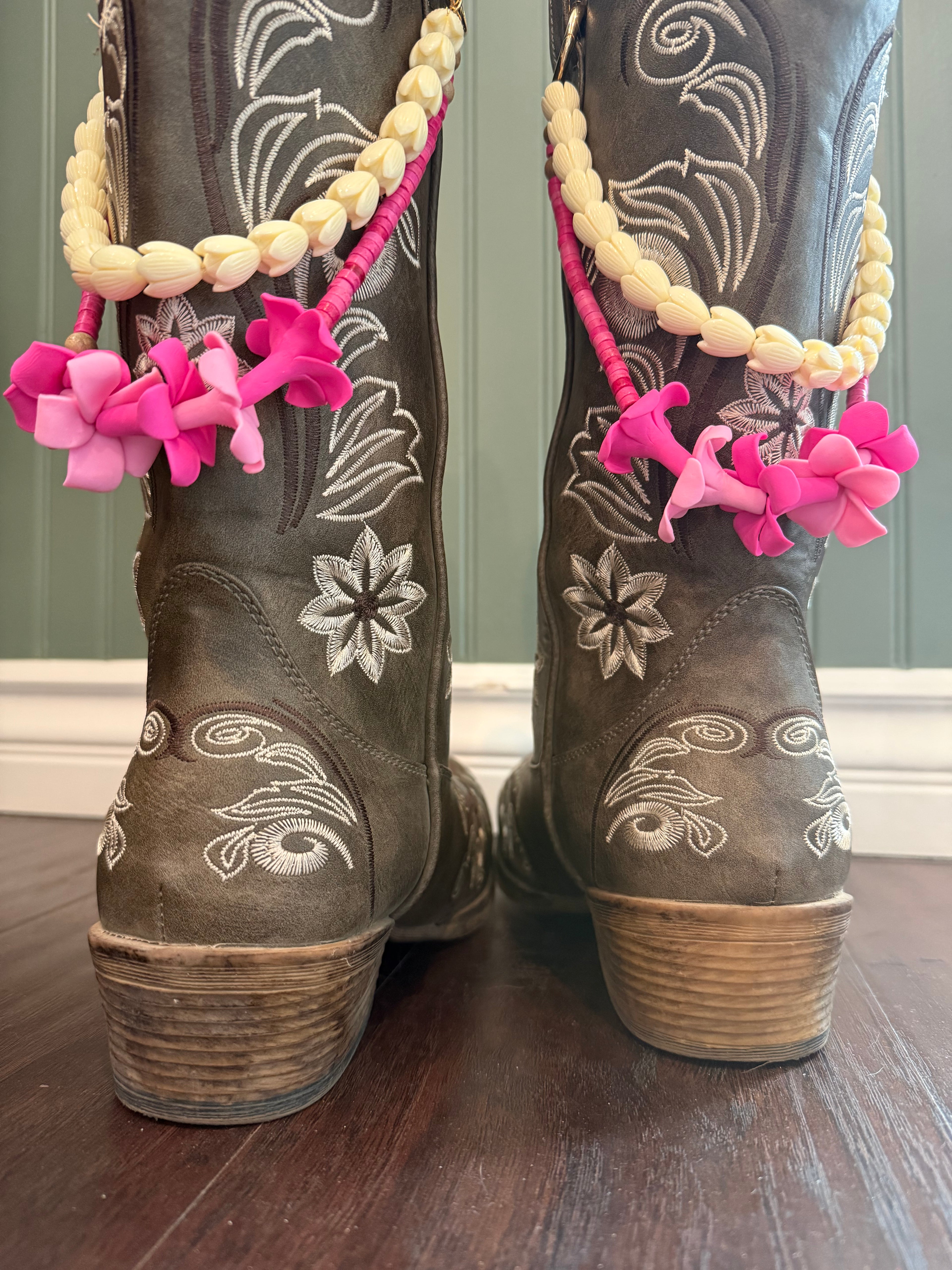brown boots with decorative beaded double  lei with pink clay flowers and white piakake beads