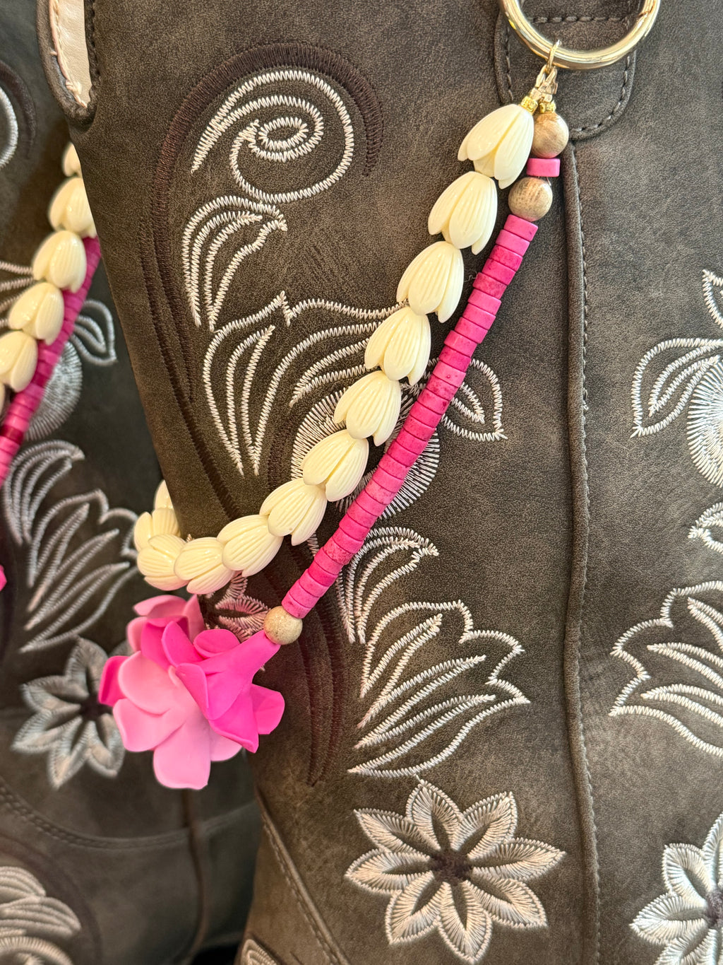 brown boots with decorative beaded double  lei with pink clay flowers and white piakake beads